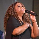 Contemporary Christian artist Octavia sings the national anthem.