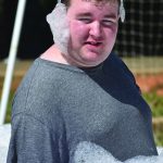 Aaron Fronek, a member of First Baptist Church, Zachary, enjoyed some time in soap suds at the 2023 Champions Camp at Tall Timbers Baptist Conference Center. The weekend for individuals with special needs drew 15 campers and 20 “buddies” and staff members. Brian Blackwell photo