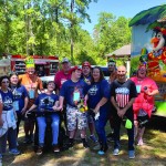 Campers, staff members and buddies enjoyed a special surprise – snow cones and visit from a fire truck at Tall Timbers Baptist Conference Center. Submitted photo