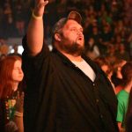 A student praised Jesus during a time of worship at YEC.