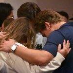 Students and BCM directors joined together in prayer during a time of decision at CEC.