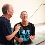 A woman rejoiced after Pastor Leo Miller baptized her on March 30, 2025.