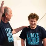 A young man was among 55 baptized during a service at First Baptist Church, Denham Springs on March 30, 2025.