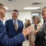 Michael Criner, left, pastor of First Rockwall in Rockwall, Texas chats with Sean and Pam Keith, right, and Philip Robertson, senior pastor of their sending church, Philadelphia Baptist Church, Deville, Louisiana. The Keith’s are two of 54 newly appointed IMB missionaries who participated in the IMB Sending Celebration, Sept. 24, at Ironbridge Baptist Church in Chester, Virginia. IMB Photo
