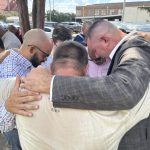 Rapides Parish School Board Superintendent Jeff Powell (right) joined others from Central Louisiana to pray for students, teachers, families and the community. Held outside the Rapides Parish School Board office in Alexandria, the event was marked by special music and prayer led by pastors of various denominations and in small groups who prayed for an area recently impacted by social media threats of possible shootings at several schools, Sept. 28-29.