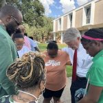 State Rep. Mike Johnson (second from right) and others from Central Louisiana gathered to pray for students, teachers, families and the community.