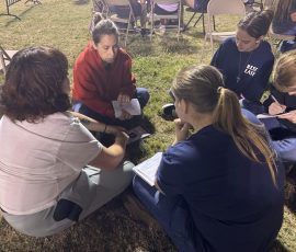 A decision counselor prayed with young men who made a decision during the West CENLA GO TELL AMERICA Crusade, April 12-15, 2026.