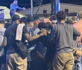 Young men embraced one another in prayer shortly after they came forward to share their decisions for Christ at the final session of the West CENLA GO TELL AMERICA Crusade, April 12-15, 2026.