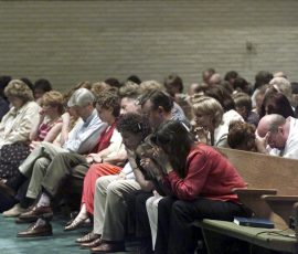 Lifeway Christian Resources employees gather for prayer following the Sept. 11, 2001, terrorist attacks. Photo by Morris Abernathy